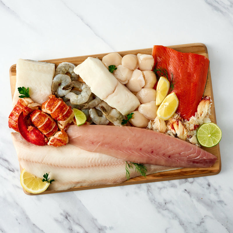 Vertical shot of seafood on a cutting board